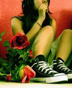 girl with red roses and black Converse