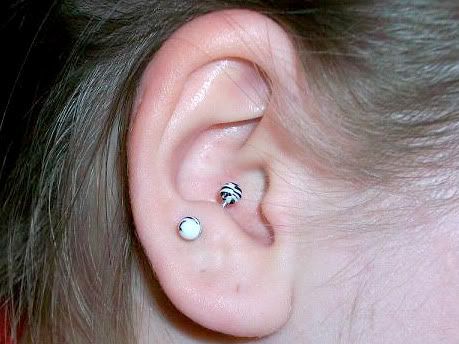 I just have a weird kind of piercing in my ear quote